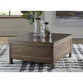 Signature Design by Ashley Moriville Brown Lift Top Cocktail Table - 36W x 36D x 18H